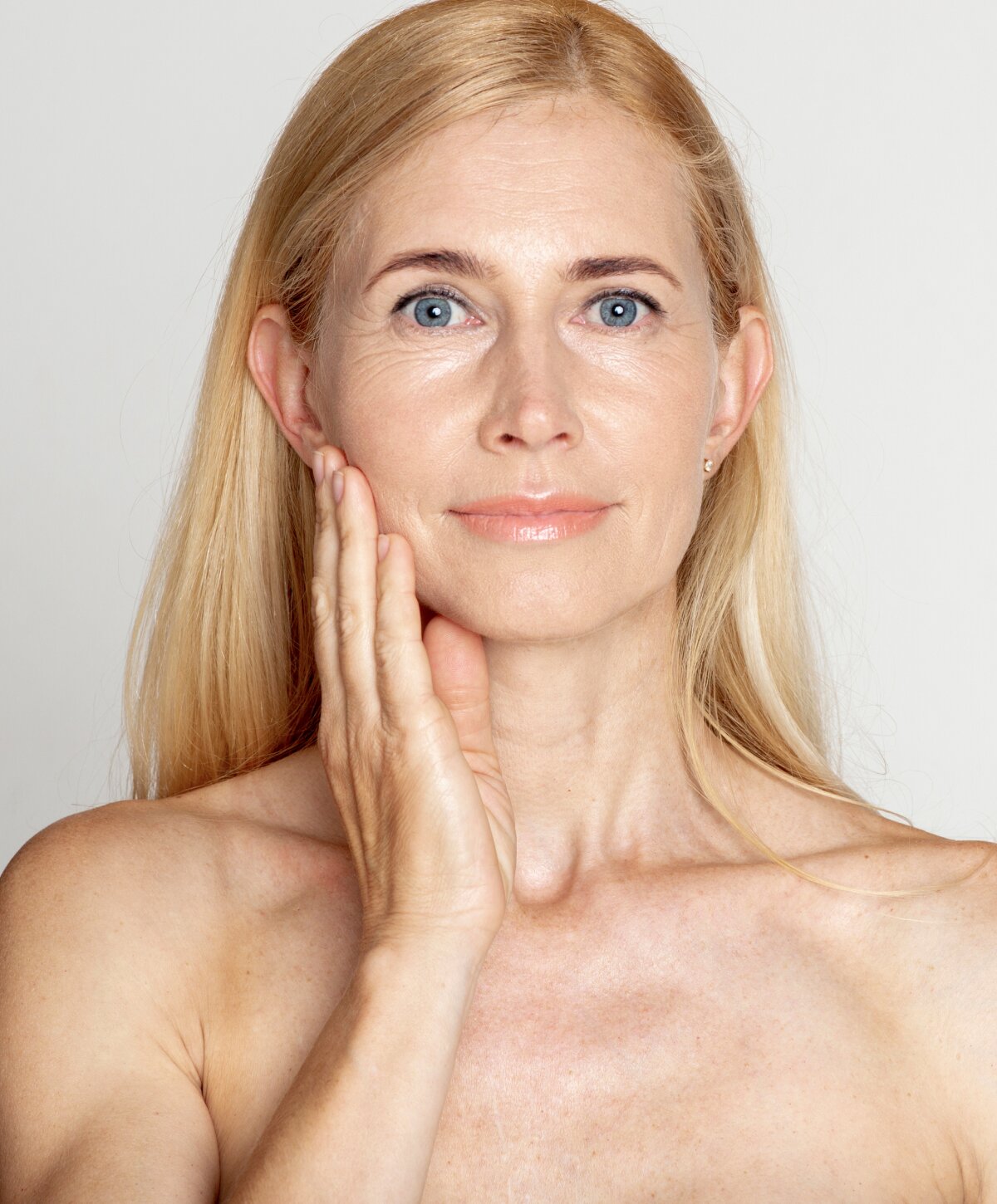 Reading Facial Fat Grafting Model with blonde hair