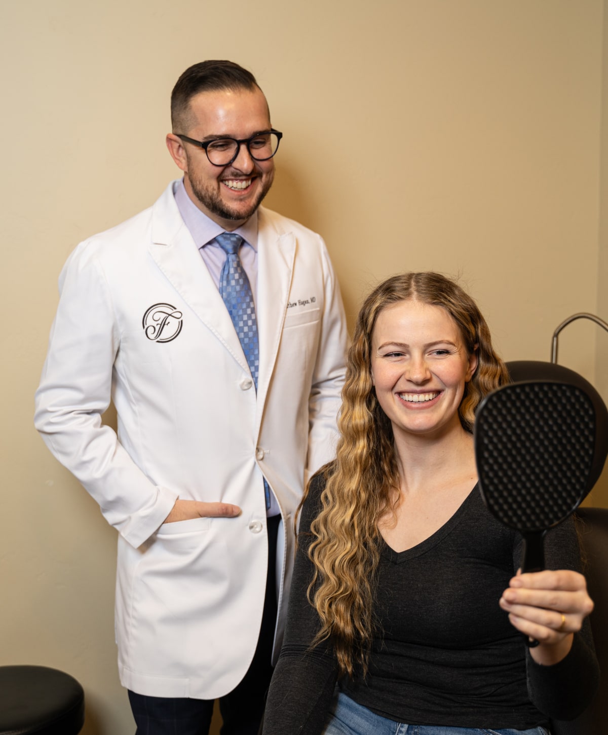 Reading Rhinoplasty Surgeon Dr. Matthew Hagan with patient