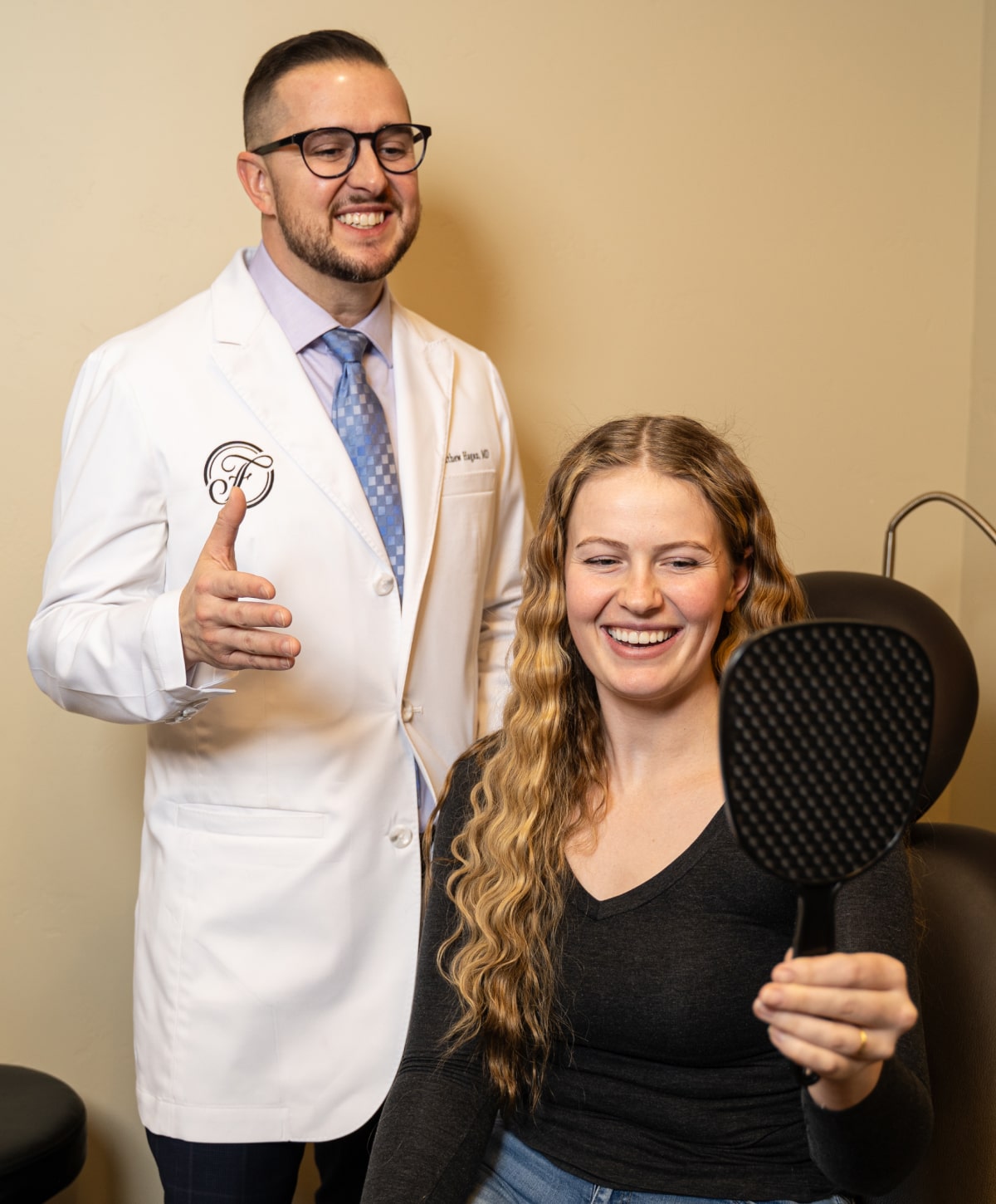 Reading Blepharoplasty Surgeon Dr. Matthew Hagan with patient